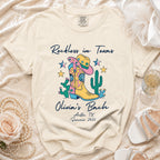"Reckless in Texas" t-shirt with cowboy boots and cactus graphic, for Olivia's Bach.