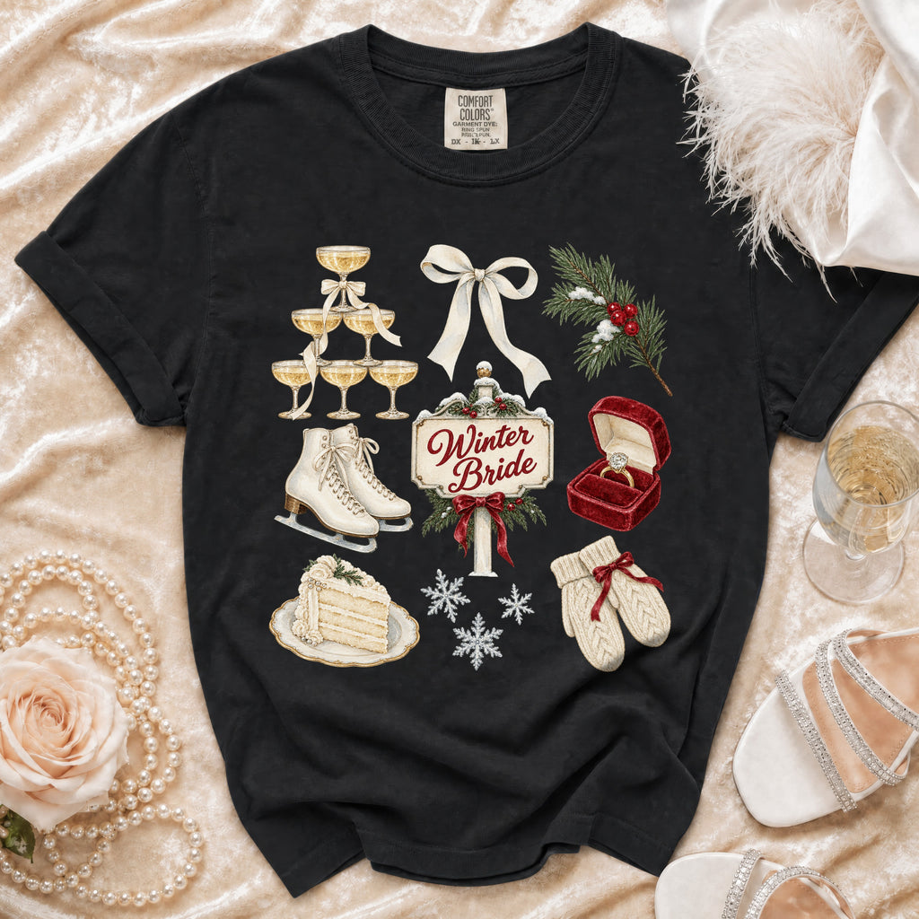 Black t-shirt with "Winter Bride" graphic featuring champagne, ice skates, cake, and winter wedding elements.
