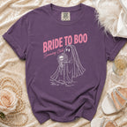 Purple t-shirt with ghost bride, skull bouquet, and text "Bride to Boo Screaming Club".