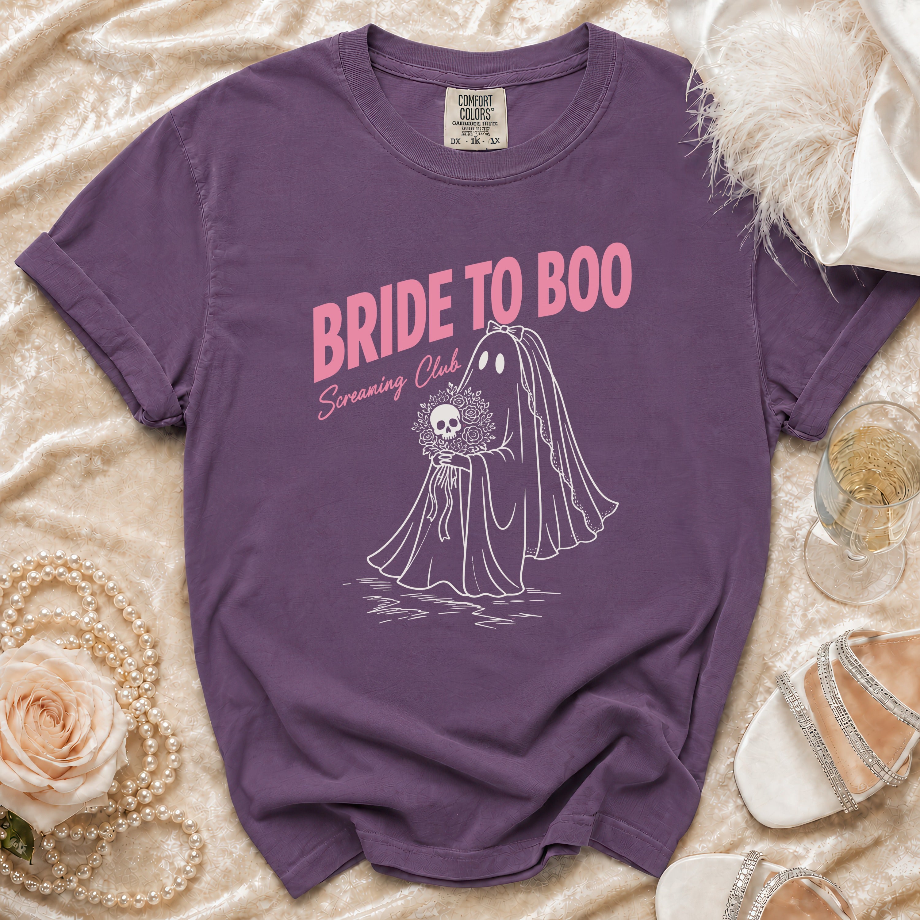 Purple t-shirt with ghost bride, skull bouquet, and text "Bride to Boo Screaming Club".