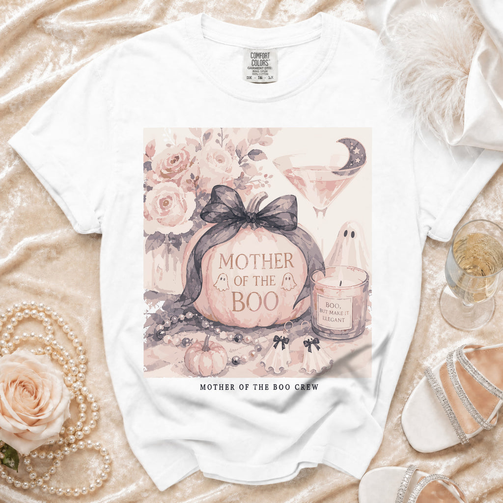 White t-shirt with "Mother of the Boo" pumpkin graphic and "Mother of the Boo Crew" text.
