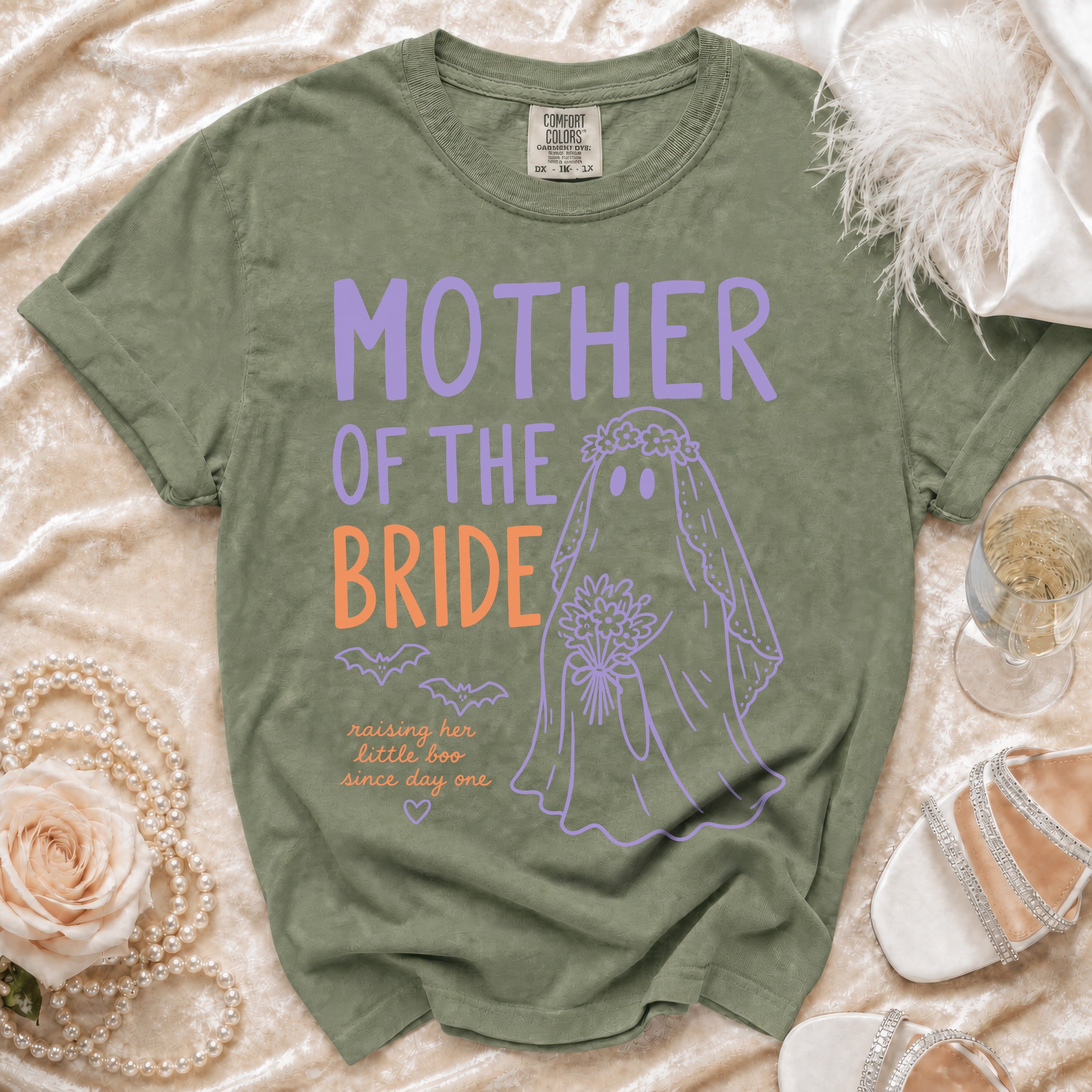 Green t-shirt with "Mother of the Bride" and a ghost bride graphic.