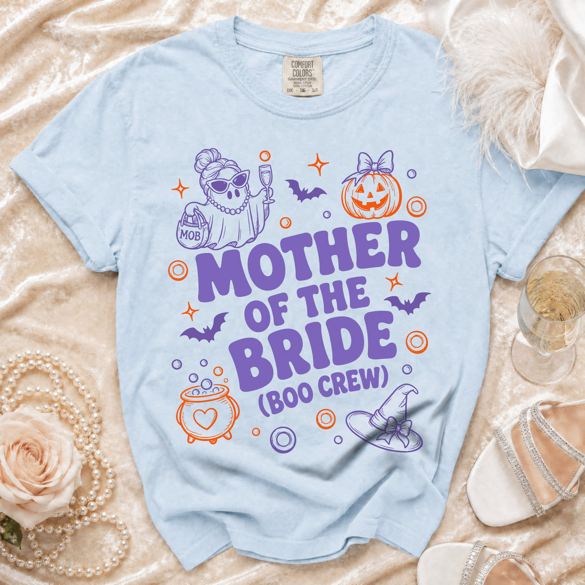 Light blue t-shirt with "Mother of the Bride (Boo Crew)" text and Halloween graphics.