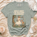 T-shirt with text "Holy Shit I'm Getting Married" and a bridal illustration.