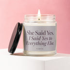 Candle with text "She Said Yes. I Said Yes to Everything Else."