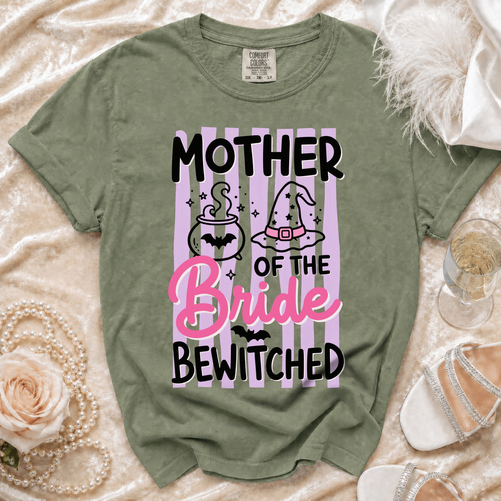 Olive green t-shirt with "Mother of the Bride Bewitched" graphic and witchy elements.