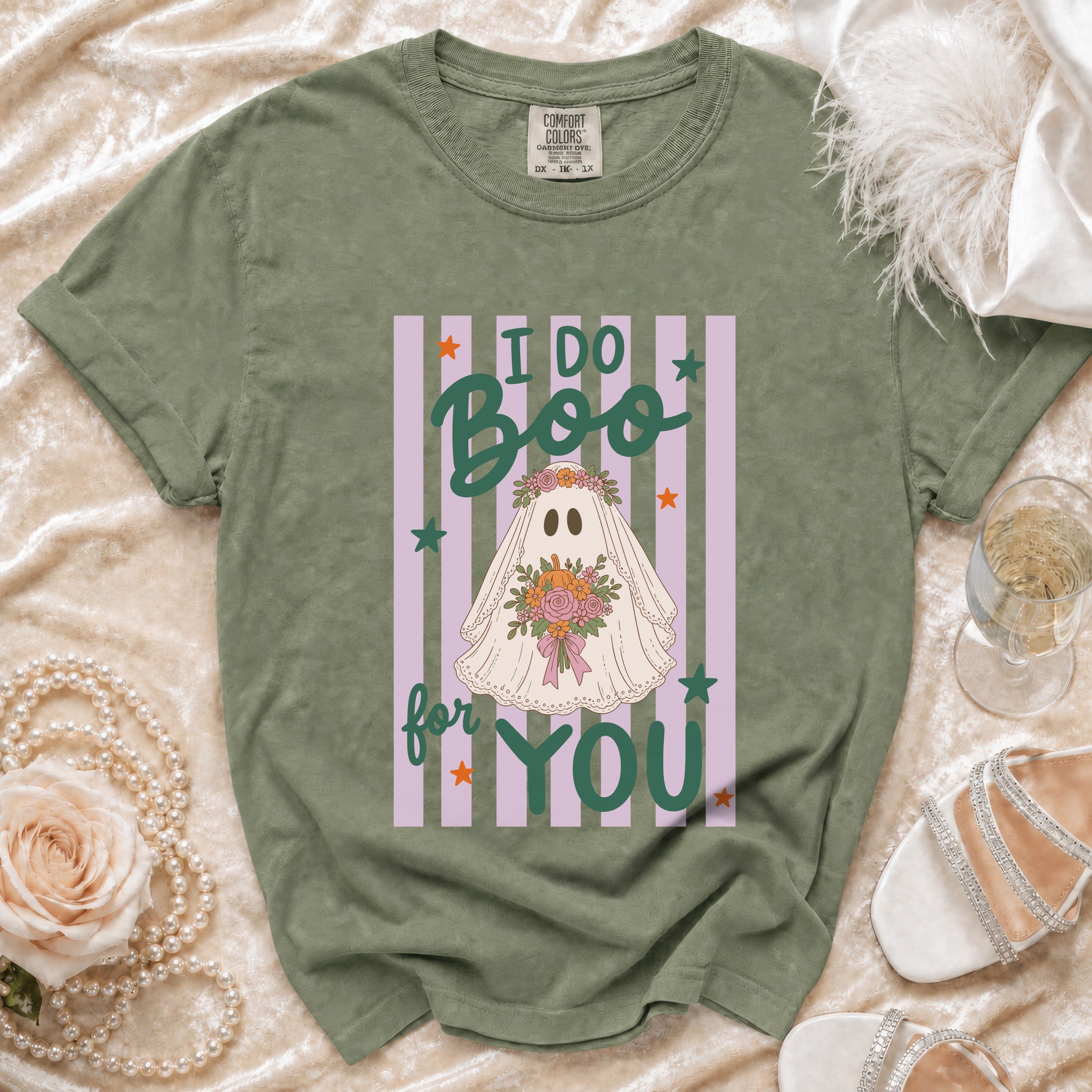Green t-shirt with ghost graphic saying "I do Boo for You".