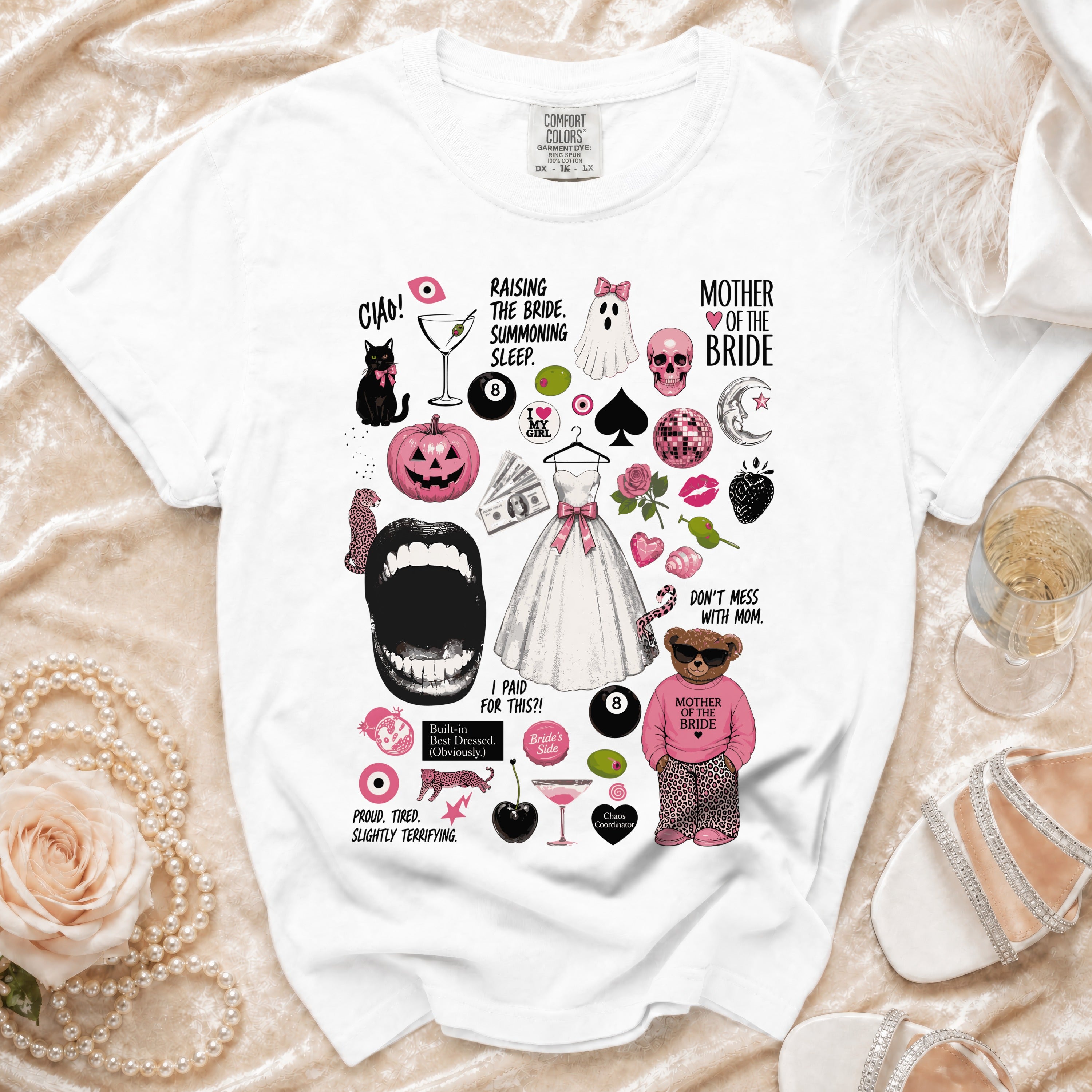 White t-shirt with "Mother of the Bride" graphics and text.