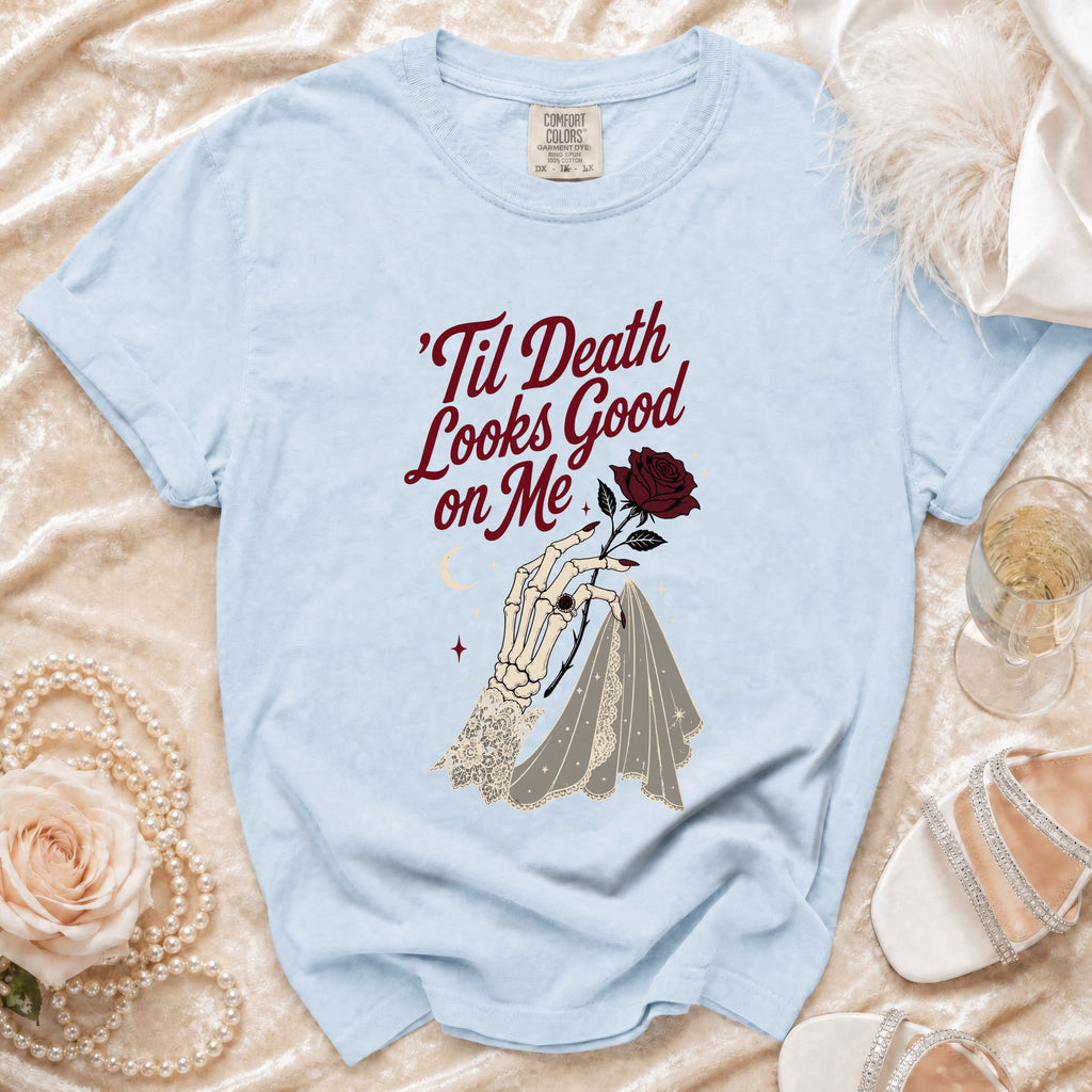 Light blue t-shirt with 'Til Death Looks Good on Me skeleton hand and rose graphic.
