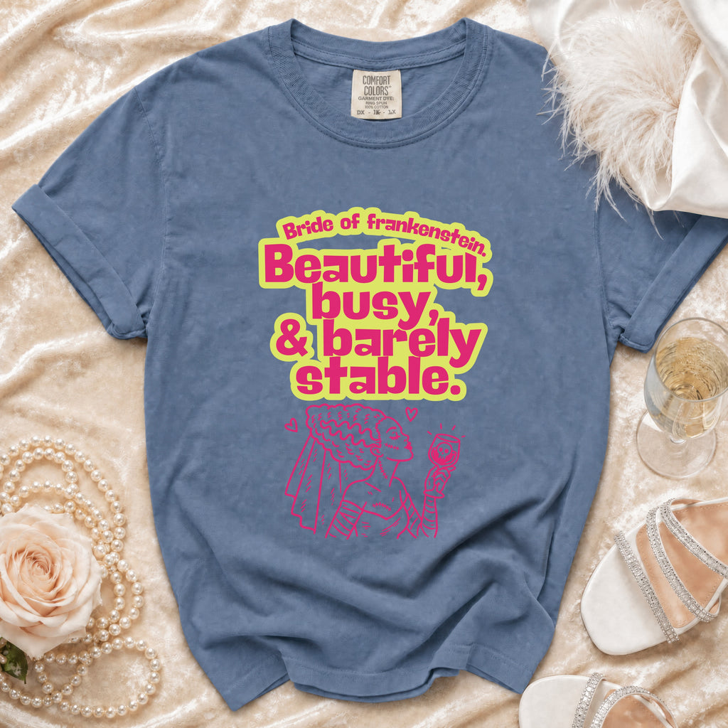 Blue t-shirt with Bride of Frankenstein design: "Beautiful, busy, & barely stable."