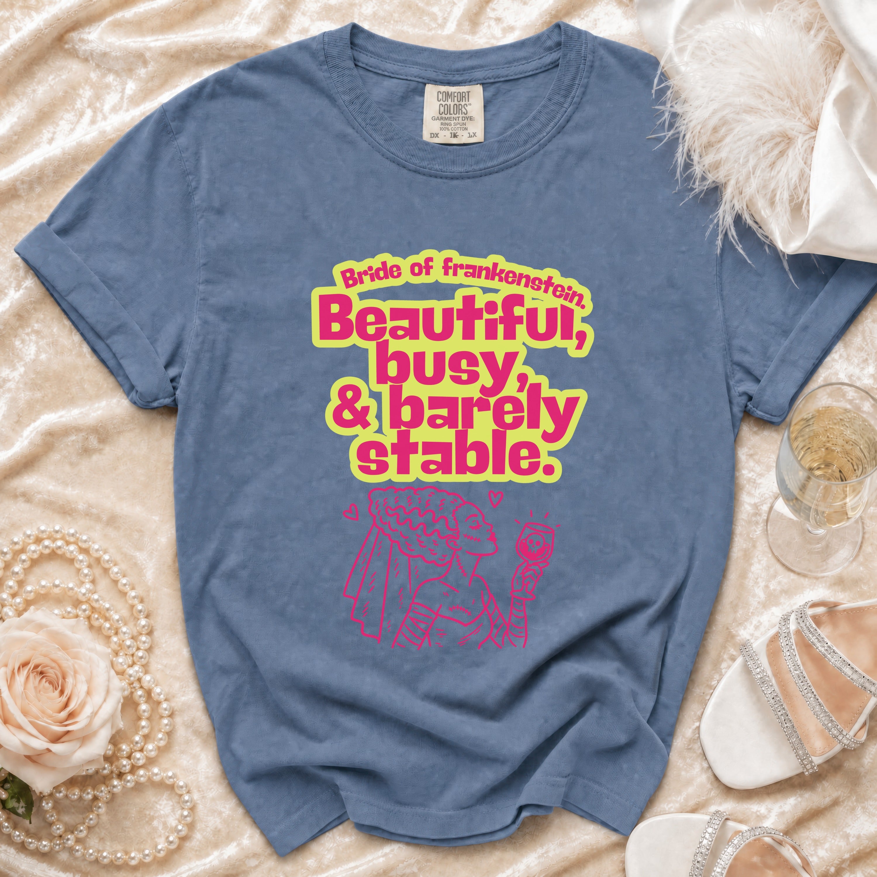 Blue t-shirt with Bride of Frankenstein design: "Beautiful, busy, & barely stable."