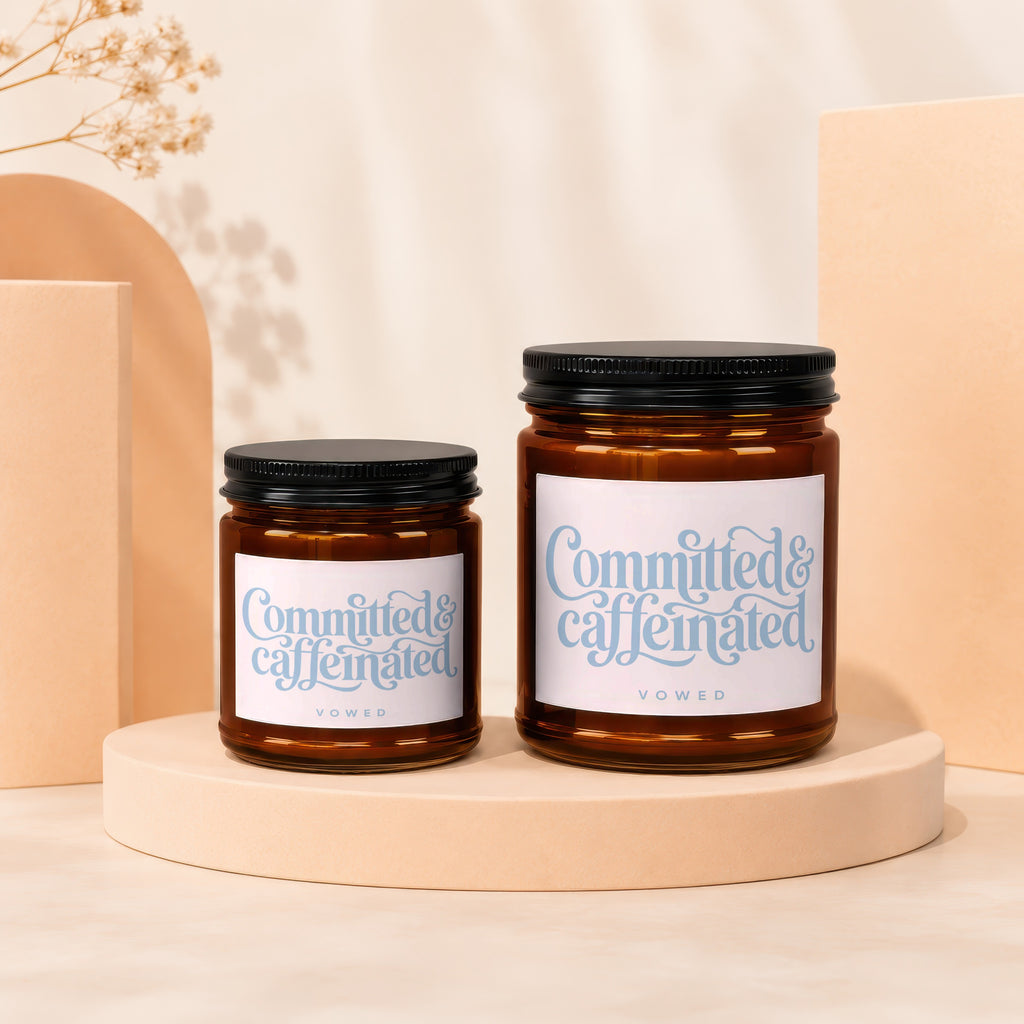 Amber glass candles with "Committed & Caffeinated" text on labels.