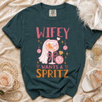 Green t-shirt with "Wifey Wants A Spritz" text and a bride-themed cocktail illustration.