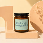 Amber jar candle with "Thank You for Standing Beside Me" text VOWED.