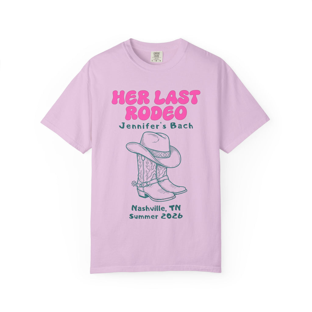 Pink t-shirt with "Her Last Rodeo Jennifer's Bach" and cowboy boots, Nashville, TN Summer 2026.