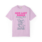 Pink t-shirt with "Her Last Rodeo Jennifer's Bach" and cowboy boots, Nashville, TN Summer 2026.