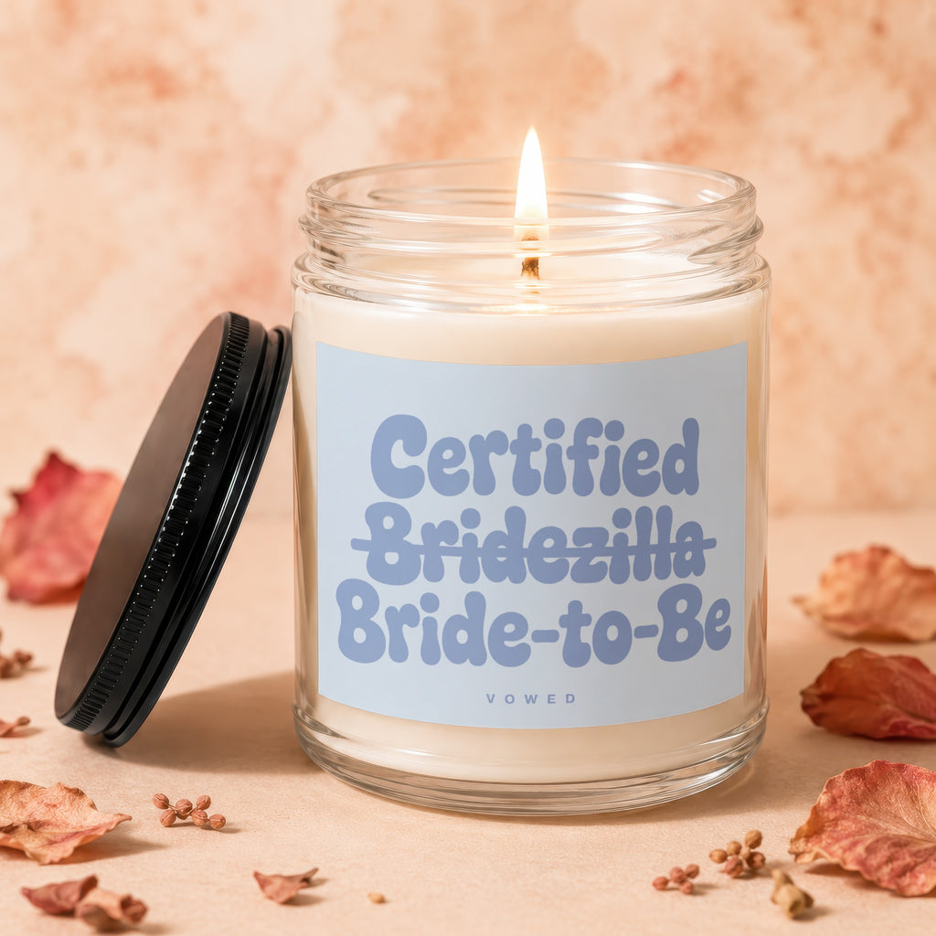 Burning candle with 'Certified Bridezilla Bride-to-Be' text on label
