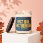 Candle lit with text "First Home, First Memories." on label.