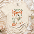 Cream t-shirt with "Mother of the Bride with the Boo-ty" text and ghost bride graphic.