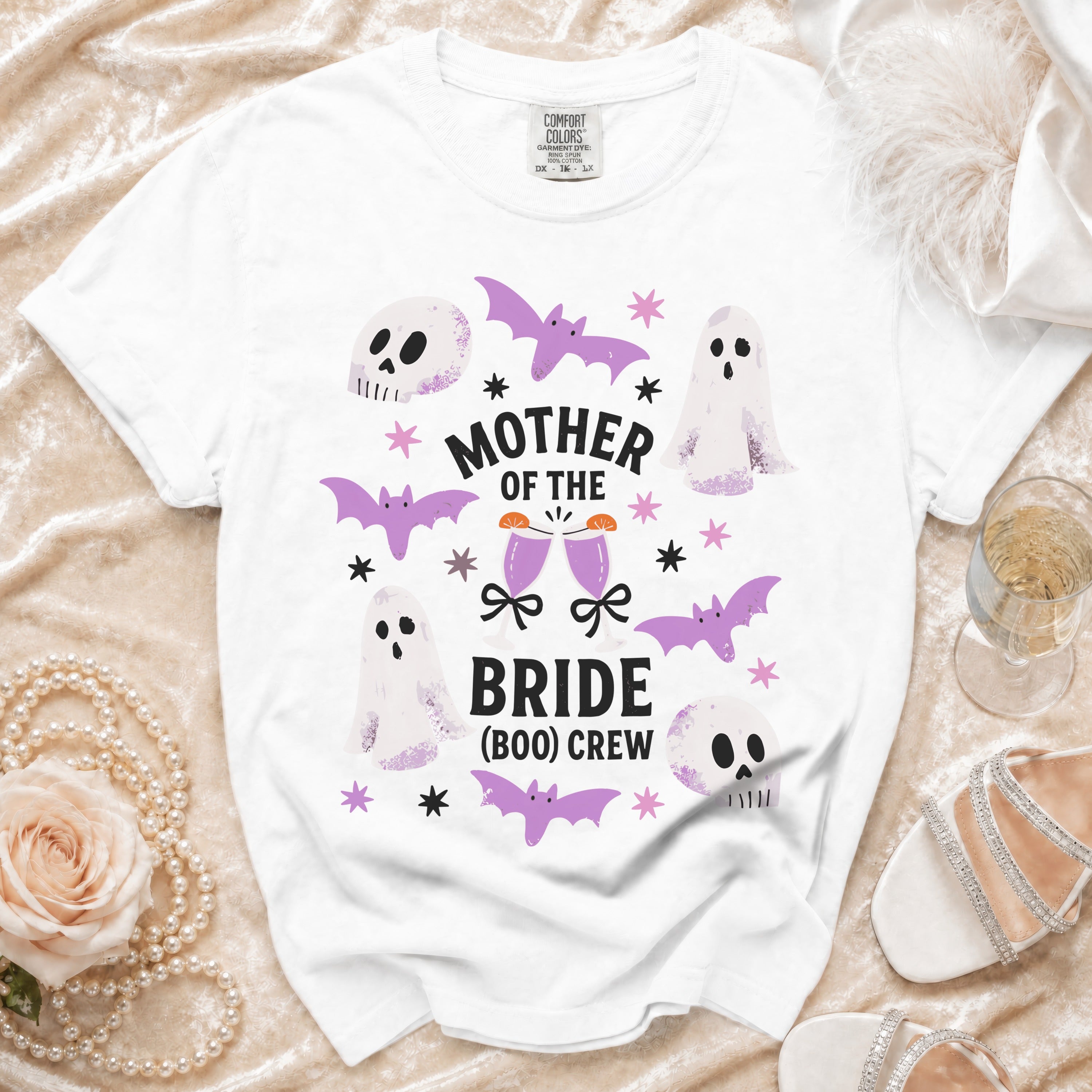 White t-shirt with "Mother of the Bride (Boo) Crew" text and Halloween graphics.