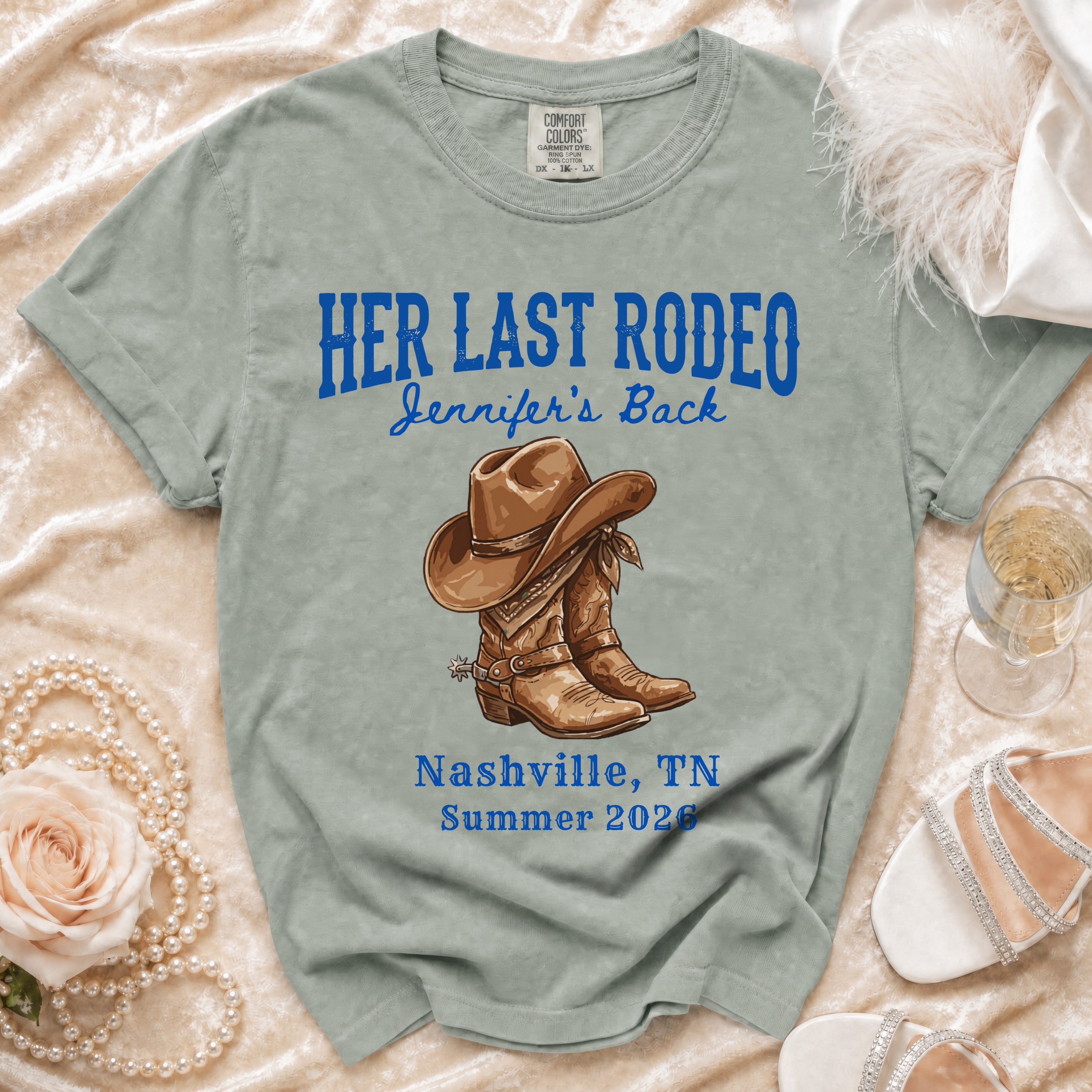 "Her Last Rodeo" text and cowboy boots graphic on a t-shirt.