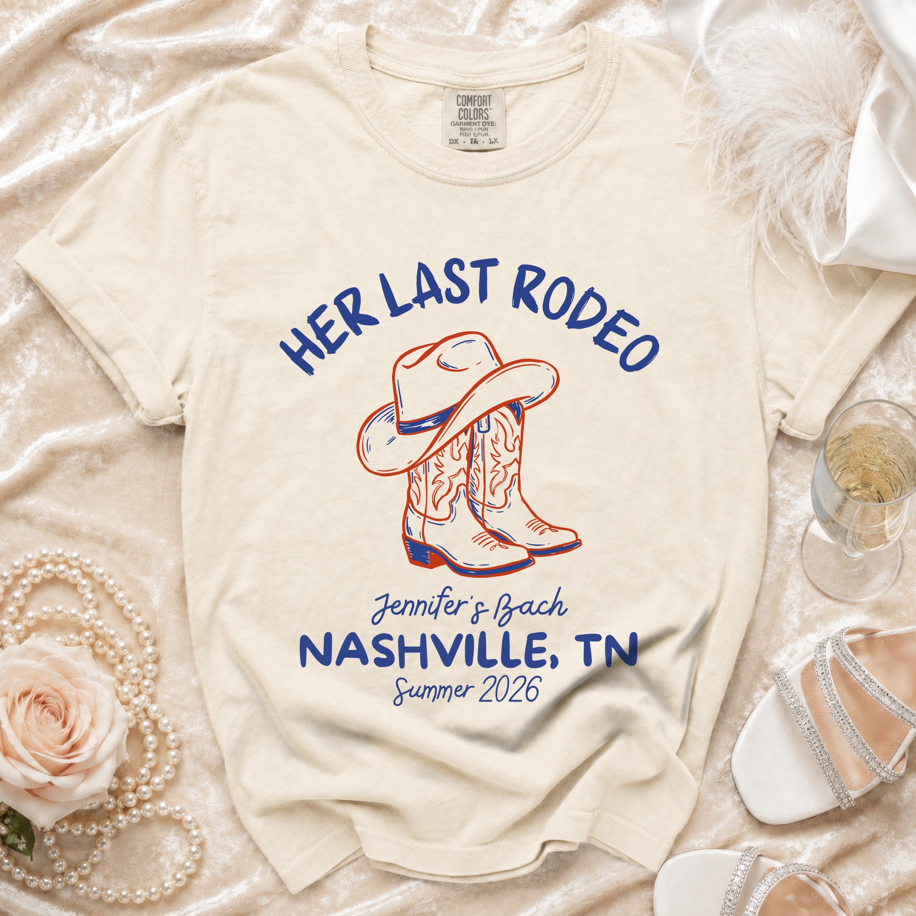 Cream t-shirt with "Her Last Rodeo" and Nashville bachelorette details.