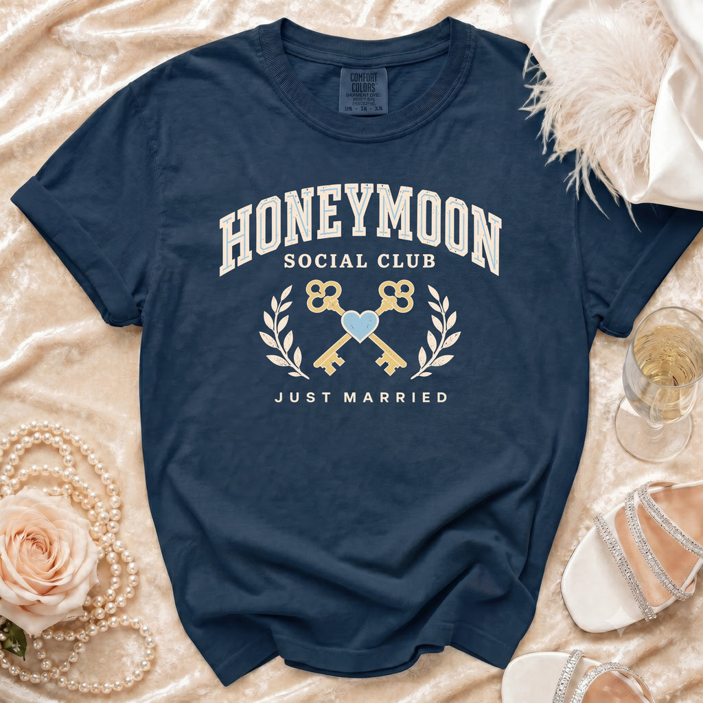 Navy Comfort Colors t-shirt with "Honeymoon Social Club Just Married" text and graphic.