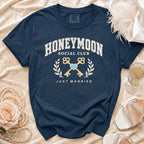 Navy Comfort Colors t-shirt with "Honeymoon Social Club Just Married" text and graphic.