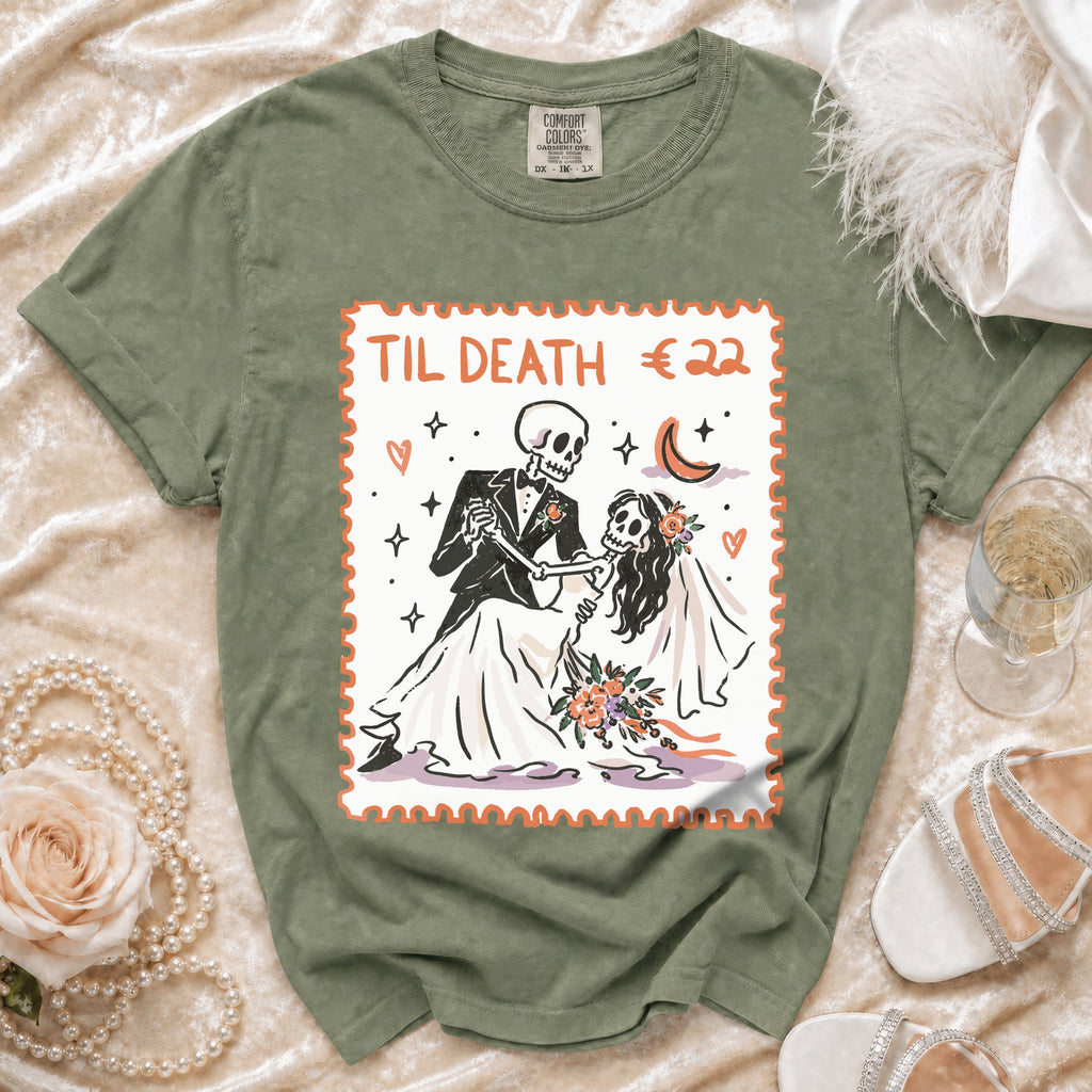 Green t-shirt with "Til Death €22" and skeleton bride and groom graphic.