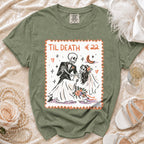 Green t-shirt with "Til Death €22" and skeleton bride and groom graphic.
