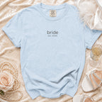 Light blue t-shirt with "bride est. 2026" printed on it.