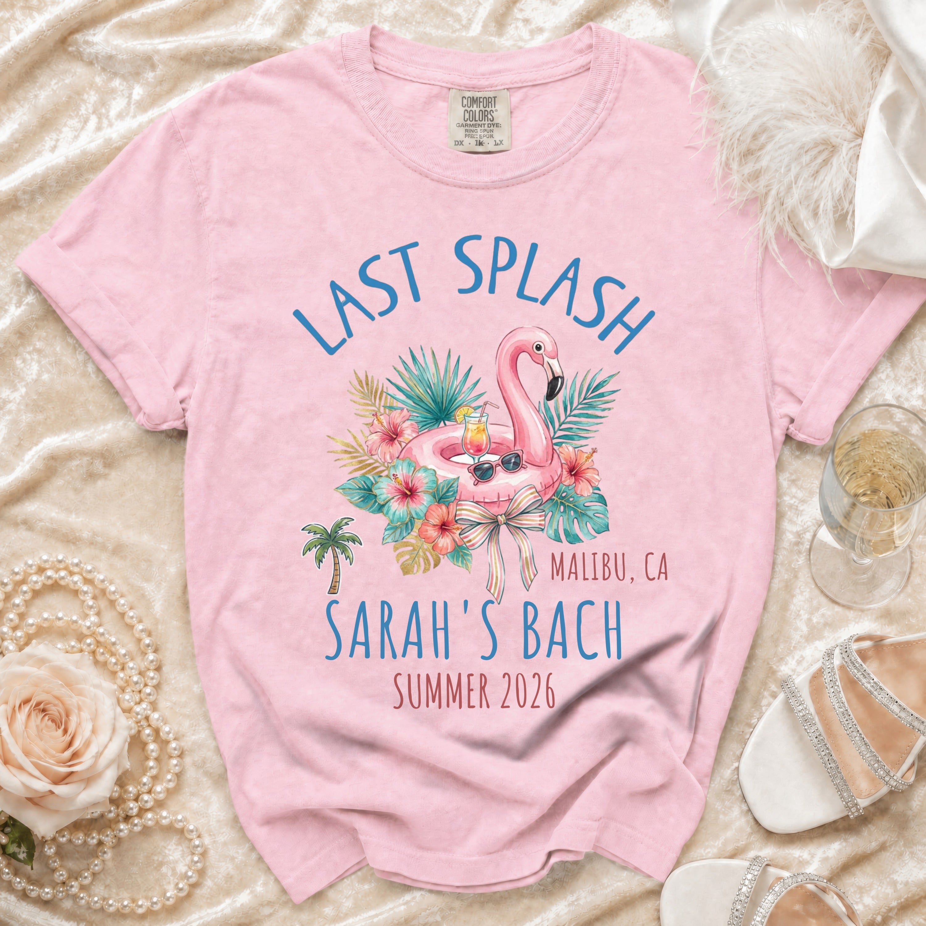 Pink t-shirt with "Last Splash Sarah's Bach Malibu CA Summer 2026" text.