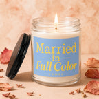 Candle with "Married in Full Color" text and a lit wick.