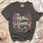 Dark gray t-shirt with "Mother of the Groom" text and floral wreath.
