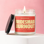 Candle with "Bridesmaid Burnout" text on a red label.
