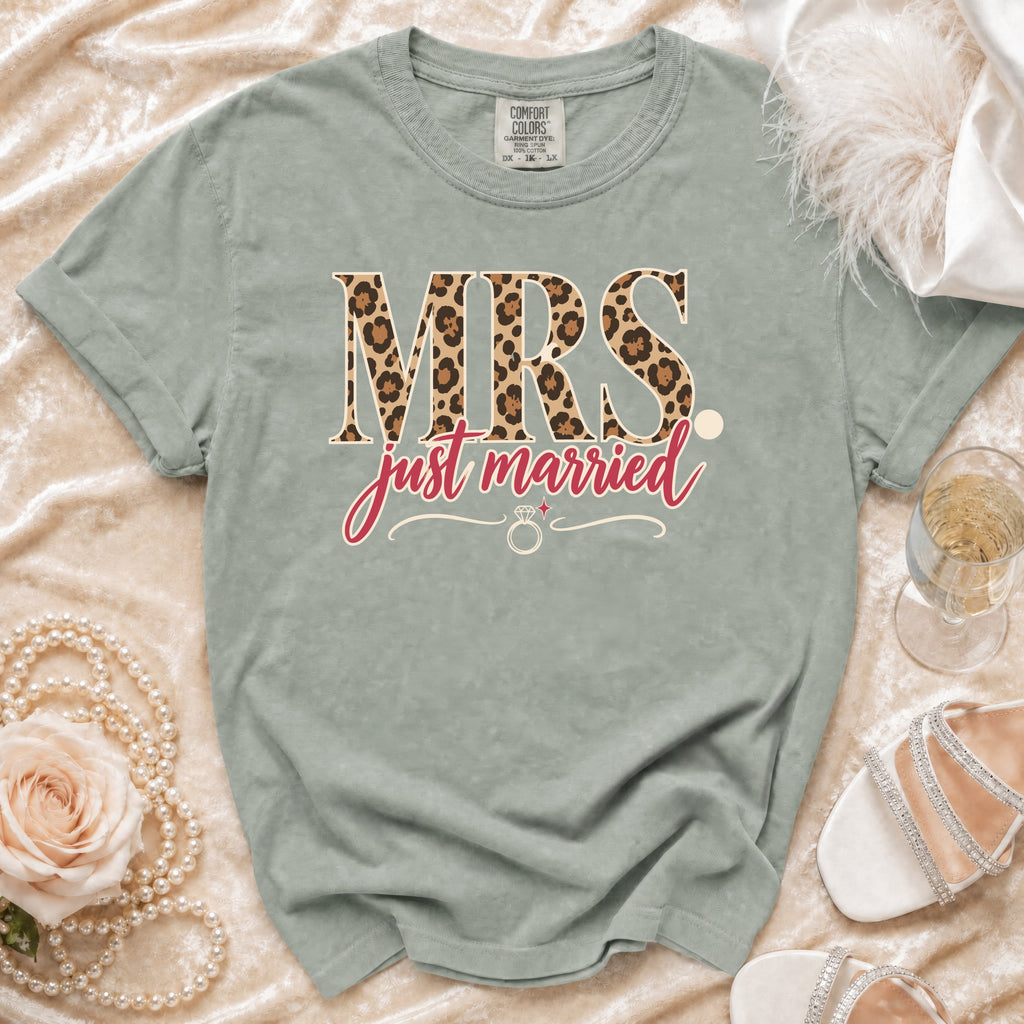 "MRS just married" text on a light green t-shirt with leopard print.
