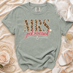 "MRS just married" text on a light green t-shirt with leopard print.