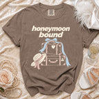 Brown t-shirt with "honeymoon bound" text and vintage luggage graphic.