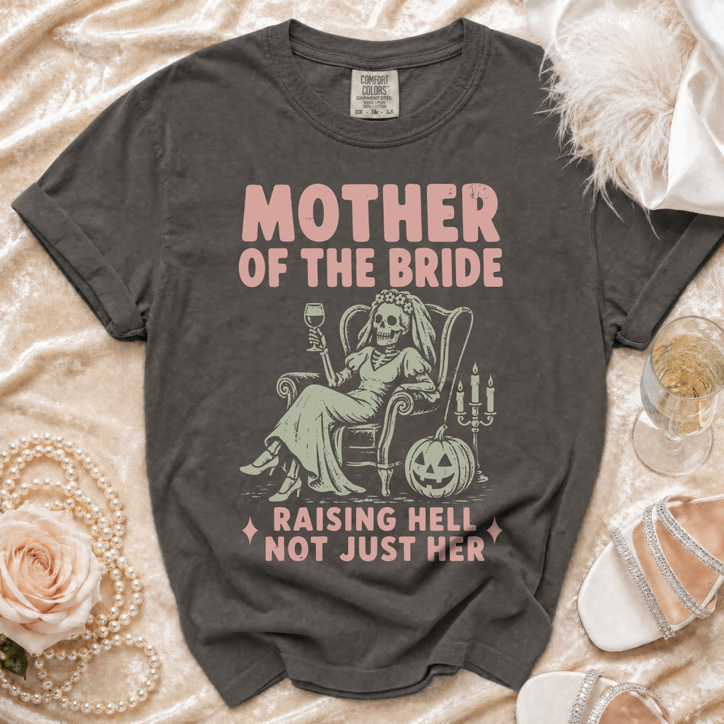 Gray t-shirt with "MOTHER OF THE BRIDE RAISING HELL NOT JUST HER" graphic.