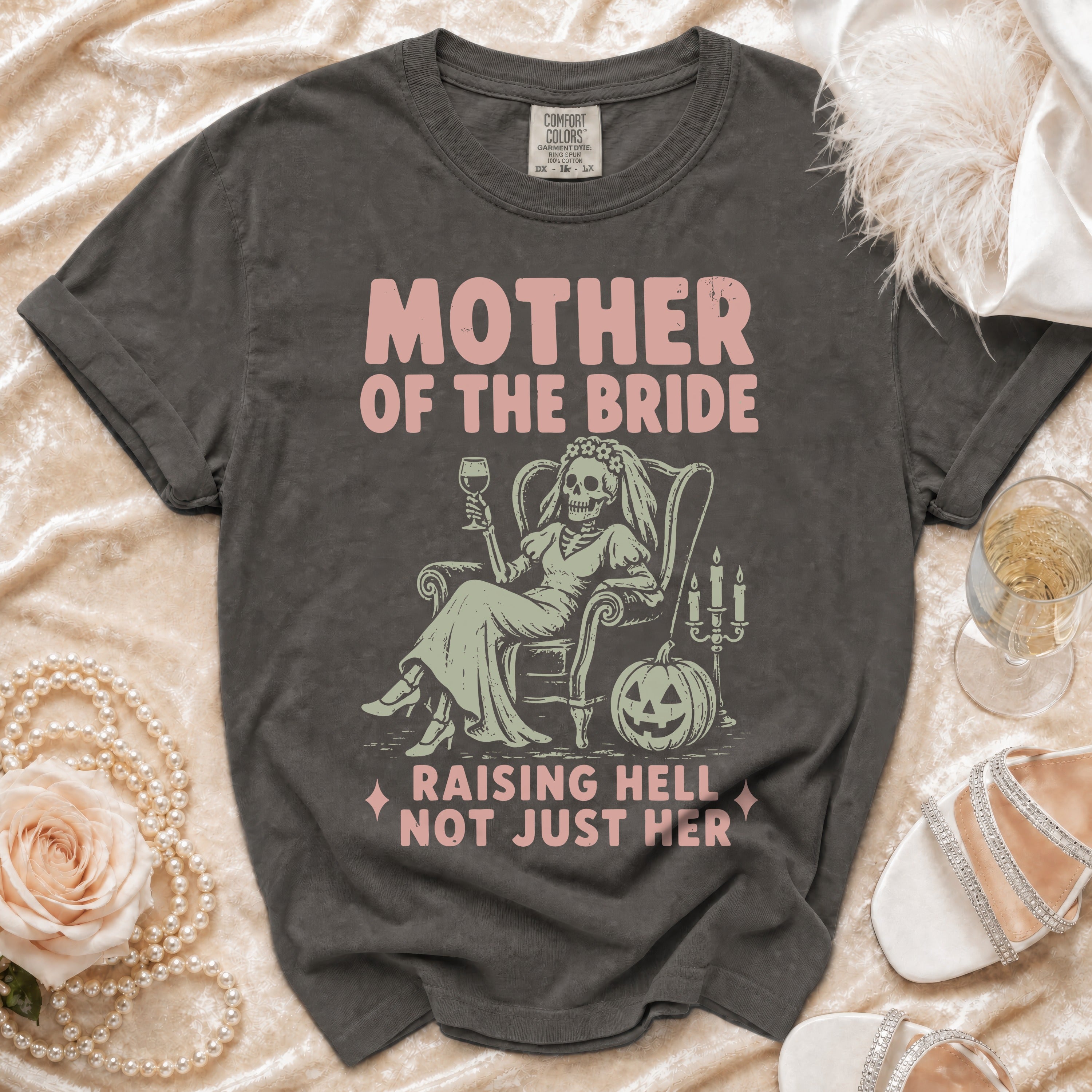 Gray t-shirt with "MOTHER OF THE BRIDE RAISING HELL NOT JUST HER" graphic.