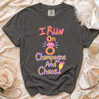Gray t-shirt with graphic text "I Run On Champagne And Chaos".