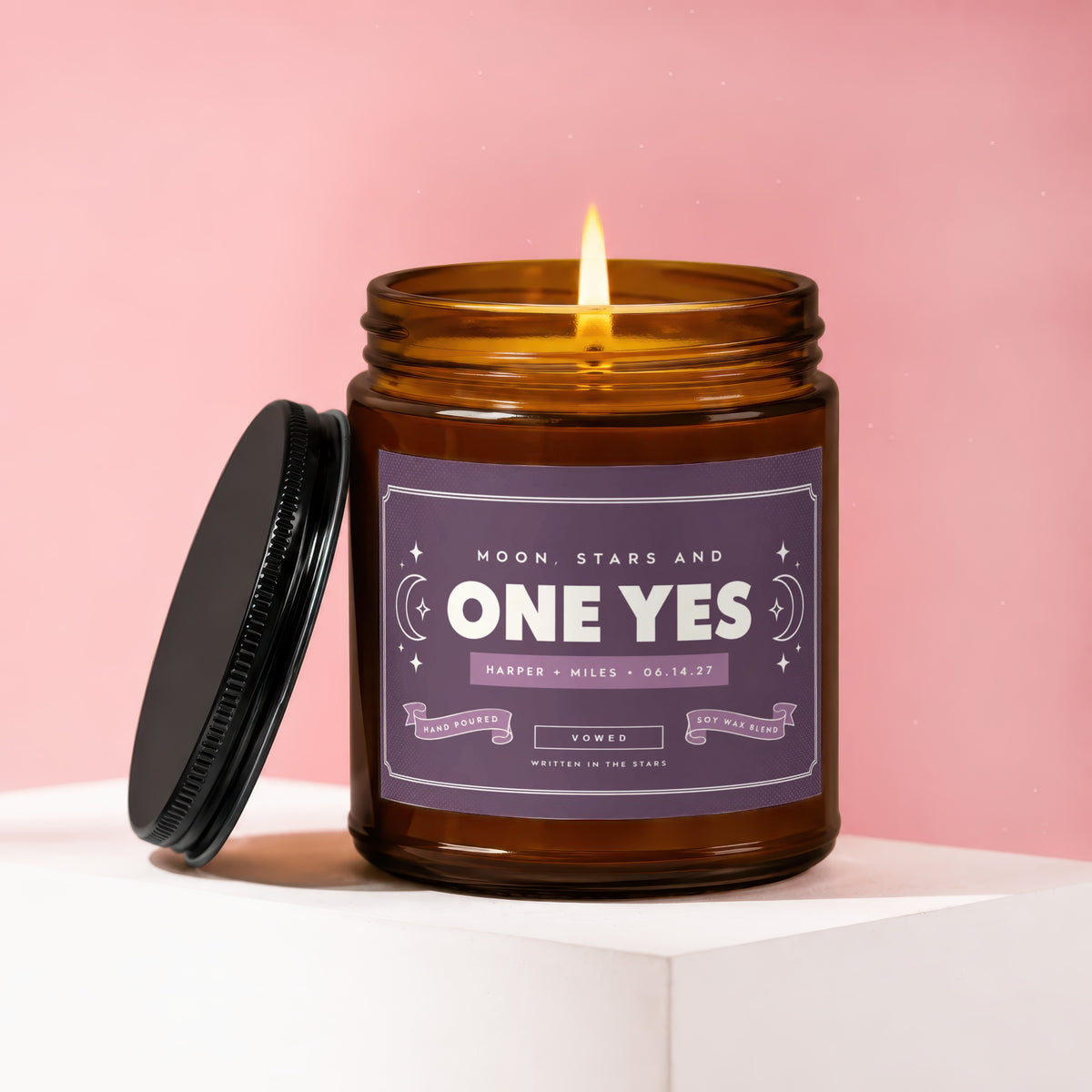 Amber jar candle labeled "One Yes" for Harper and Miles, 06.14.27.