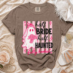 Brown t-shirt with ghost bride graphic: "half BRIDE half HAUNTED fully booked."
