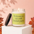 Candle with "Welcome to my cult bridal party" text on a lime green label.
