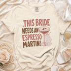 Comfort Colors shirt with "This Bride Needs An Espresso Martini" text and cocktail graphic.