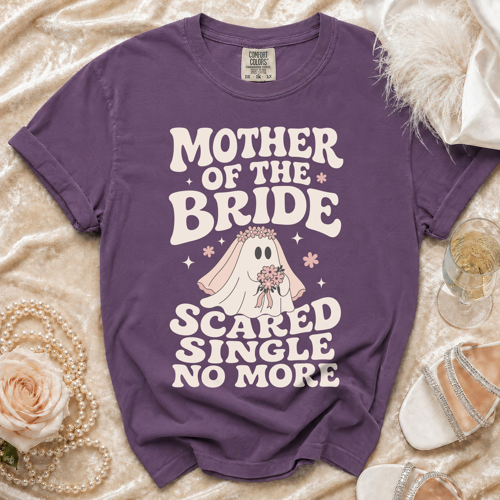 Purple t-shirt with "Mother of the Bride Scared Single No More" text and ghost graphic.