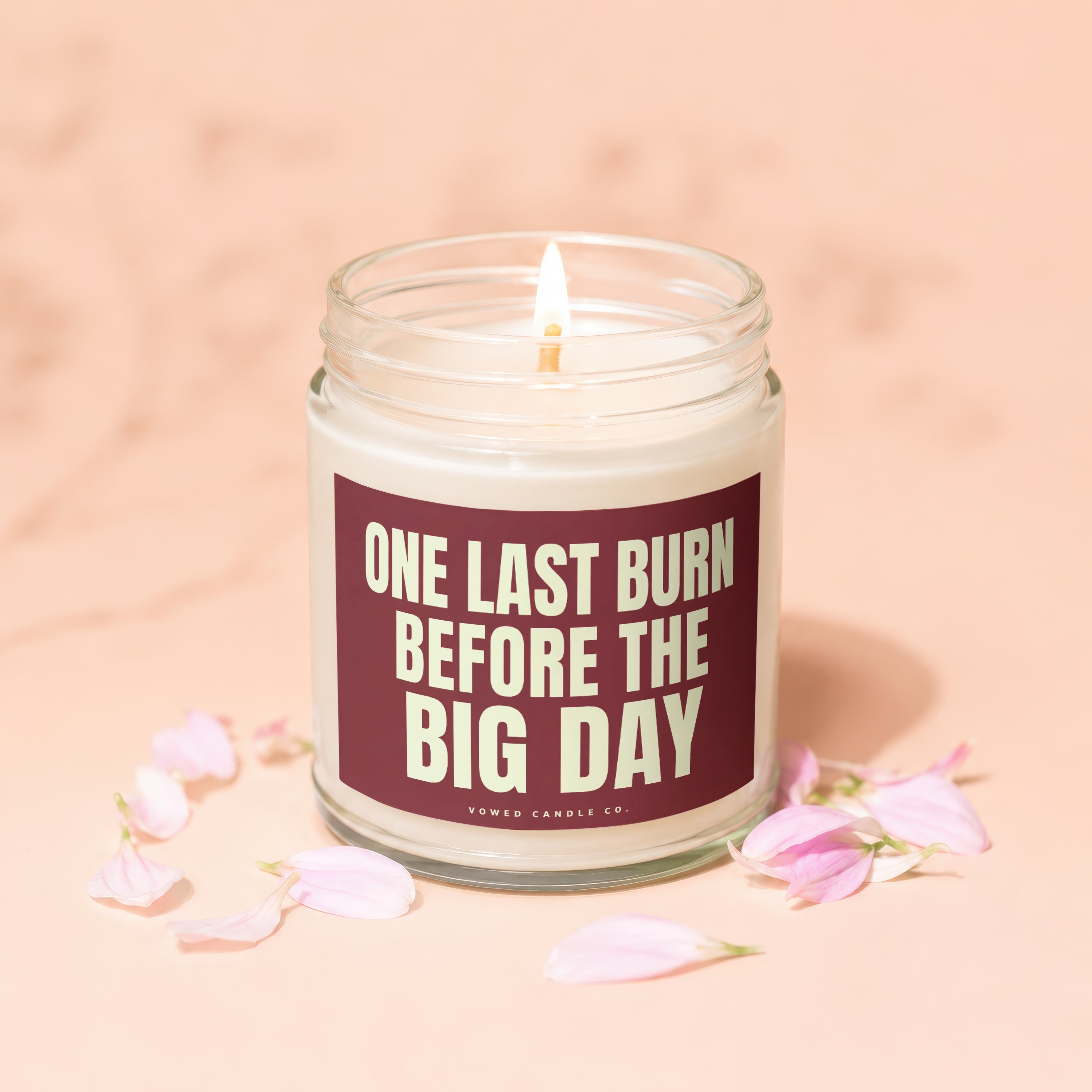 Glass candle with burgundy label reading "ONE LAST BURN BEFORE THE BIG DAY".