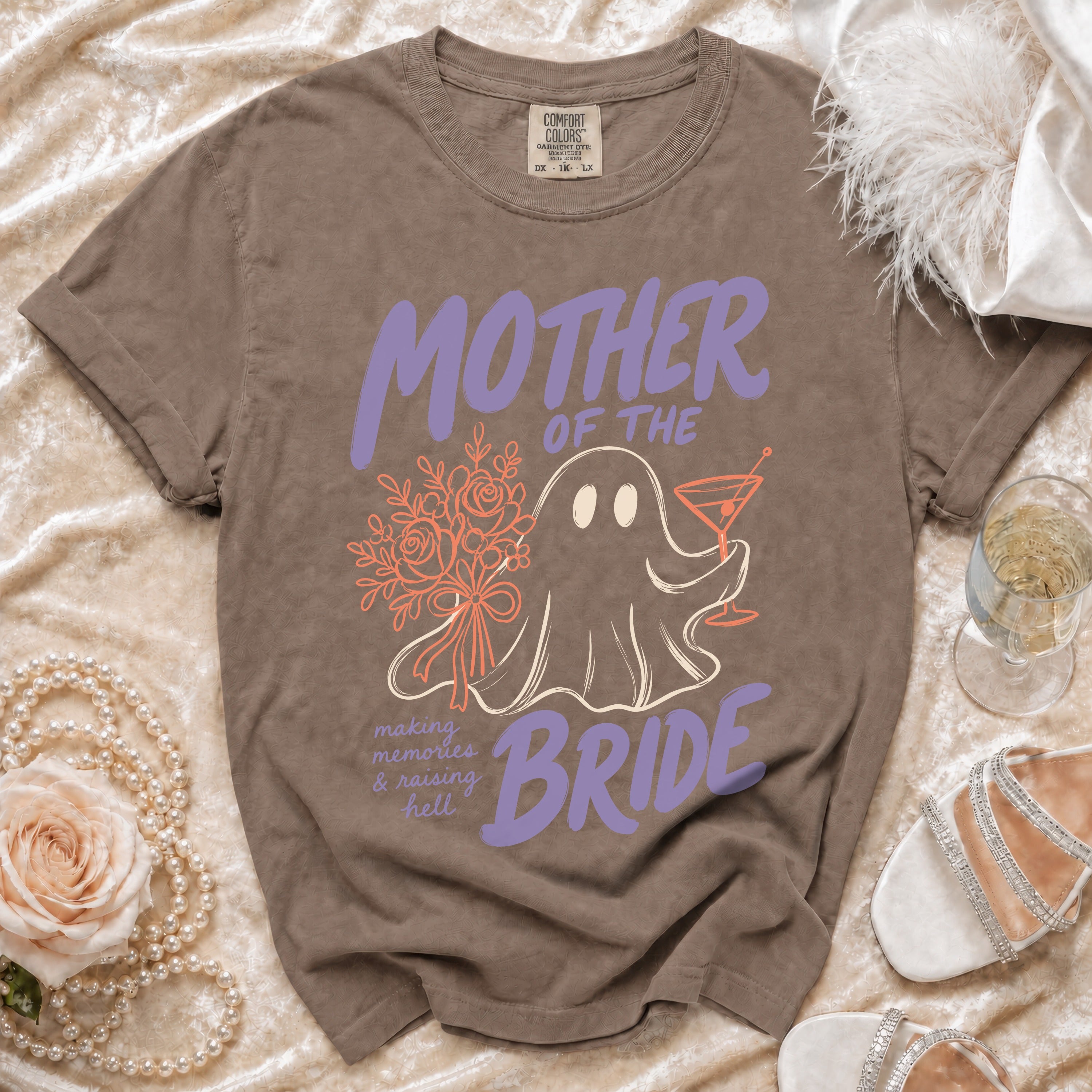 Brown t-shirt with "Mother of the Bride" text, ghost, flowers, and martini.