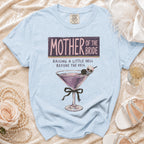 Light blue t-shirt with "Mother of the Bride" graphic and martini glass.