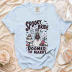 Light blue t-shirt with "Spooky Bride 'Til Death Do Us Party Doomed to Marry" graphic.